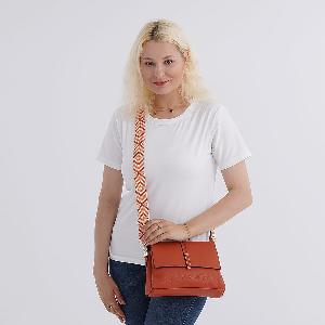 Artisan Crossbody Sling Bag with Geometric Pattern Strap