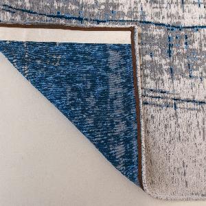 Raggiodiluna tapis en coton à motifs abstraits