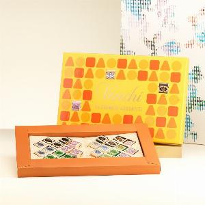 30 Rabatt Gelbe Geschenkbox mit verschiedenen CreminiPralinen 270 g