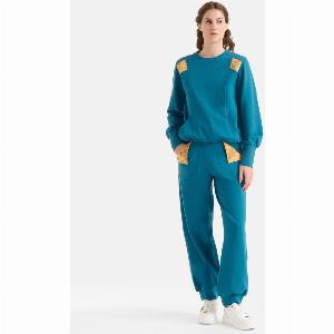 Jogger in felpa garzata stretch con tasche Geo Classic Pavone