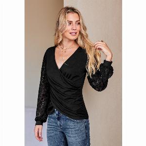 20 Rabatt auf Schwarzes WickelTop mit stylischen Ballonärmeln